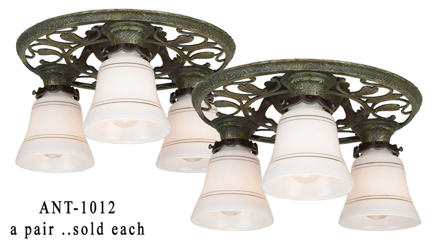 Matched pair of Turn of the Century, Three Light, Arts & Crafts, Low Ceiling Chandeliers.